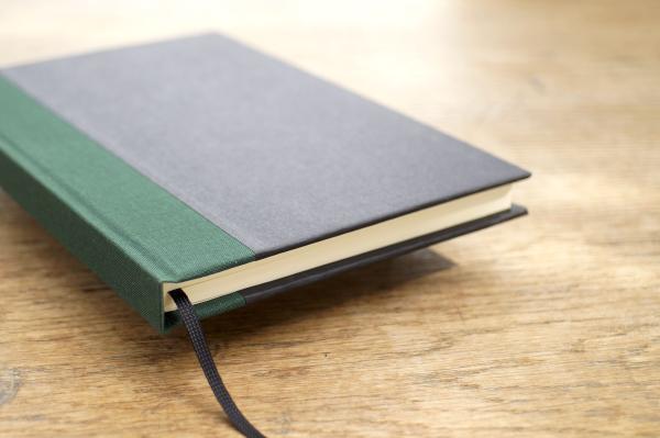 Writing and notebook black, with green linen